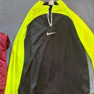 Black and yellow Nike athletic shirt